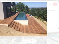 an image of a pool being built on the side of a house with stairs leading up to it