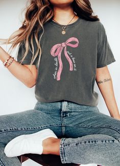 This is a high quality Comfort Colors tshirt with a trendy coquette aesthetic.🎀 This tee has a relaxed fit and a soft, lived-in feel you're going to love! Size up for an oversized trendy look and please refer to our size chart before ordering! We do direct-to-garment printing on our items. DTG is a process in which pigmented water-based inks are applied to the garment's surface and are absorbed by the product's fibers. The process itself resembles digital printing on paper. Disclaimer: colors a Coquette Tshirt, Coquette Clothes, Coquette Top, Shirt Coquette, Tshirt Illustration, Soft Girl Era, Graphic Trends, Comfort Colors Tshirt, Aesthetic Coquette