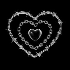 a heart made out of barbed wire with a black background