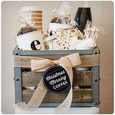 a wooden crate filled with coffee and other items