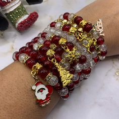 These Christmas stretchy red and white bead bracelets with golden charms are handcrafted personally for me, Derlis. You can pick your size bracelet. Choose your favorite charm/style or without charm, mix and match and create your own stack. Perfect Christmas gift for both kids and adults alike. Also, fun to combine with your Ugly Christmas Sweater, to wear everyday during Christmas season or at Christmas parties with family and friends. It is very important that you measure your wrist before pla Beaded Christmas Bracelets, Christmas Crackle, Outfit Ideas Christmas, Reindeer Christmas Tree, White Beads Bracelet, Bracelet Christmas, Outfit Christmas, Christmas Gifts For Boyfriend, Christmas Bracelet