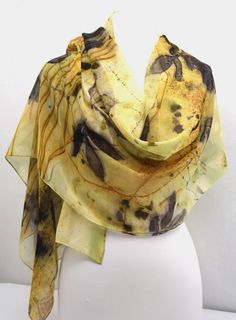 Lightweight, this silk chiffon scarf has been printed with metal and real leaves. Infused with various shades of yellows and greens, this scarf is wide enough to wear as a shawl or light enough to wear as a scarf - lots of possibilities! Approximately 22x84". Free Shipping! Eco Print Scarf, Yellow Silk Scarf, Rust Dye, Hand Dyed Scarves, Eco Print, Silk Chiffon Scarves, Real Leaves, Fabric Inspiration, Green Scarf