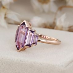 Experience The Beauty Of Our Amethyst Cluster Baguette Engagement Ring, Featuring A One-Of-A-Kind Hexagon Cut. The 14k Rose Gold And Art Deco Design Make This Ring A True Work Of Art. 14k Gold Amethyst Ring In Art Deco Style, 14k Gold Art Deco Amethyst Ring, 14k Gold Amethyst Ring Art Deco Style, Art Deco Baguette Cut Gemstone Jewelry, Art Deco Jewelry With Baguette Cut, Baguette Cut Amethyst Jewelry As A Gift, Amethyst Baguette Cut Jewelry For Gift, Baguette Cut Amethyst Jewelry For Gifts, Baguette Cut Amethyst Jewelry Gift