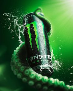 a can of monster energy drink in the water