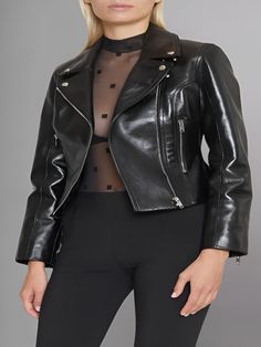 Indulge in the perfect blend of fashion and function with the Women's Cinched Leather Motorcycle Jacket, a sophisticated and edgy piece that seamlessly merges the classic allure of a motorcycle jacket with the modern charm of cinched detailing. This jacket isn't just outerwear; it's a bold fashion statement that captures attention and exudes a timeless yet contemporary vibe. Crafted with precision from high-quality leather, the Cinched Leather Motorcycle Jacket promises not only a sleek and stylish exterior but also durability, creating a garment that stands as a symbol of enduring fashion. The cinched detailing adds a touch of femininity and a flattering silhouette, making it a versatile and essential piece for the modern woman's wardrobe. The design of the Women's Cinched Leather Motorcy Leather Motorcycle Jacket Women, Motorcycle Jacket Women, Motorcycle Culture, Leather Motorcycle Jacket, Women's Wardrobe, Bold Fashion, Distressed Jeans, Night Dress, Modern Woman