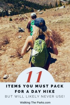 two people hiking up a hill with the words 11 items you must pack for a day hike