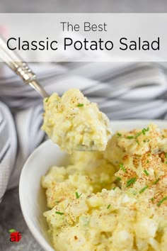 a bowl filled with mashed potatoes on top of a table