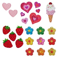 several different types of ice cream and strawberries with hearts, flowers, and shapes