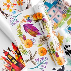 an assortment of wrapping paper with different designs on them