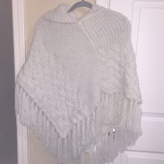 Very Pretty Knit Shawl With Fringe Detail On Bottom In Off White By Coco & Carmen. New Without Tags No Picking, Stains, Rips, Etc. If You Have Any Questions Leave Me A Comment. Happy Shopping! White Knit Poncho, White Knitted One-size Poncho, Cozy White Knit Poncho, Casual White Knit Poncho, White Casual Winter Poncho, Casual White Winter Poncho, Hand Knitted White Poncho For Winter, Cozy White Knitted Poncho, Shawl With Hood