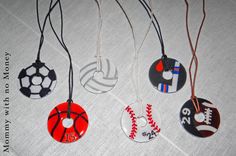 four different sports themed necklaces on a white tablecloth with text that reads, i love you to the ball and back