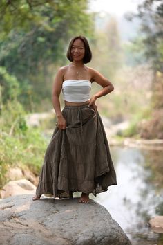 "This beautiful Skirts with  made from lightweight cotton fabric. which perfectly fit to your festival, beach, summer vacation or just new addition to your wardrobe that will inspire you for your new street look! This Skirts is comfortable and relaxation for any occasion.      🪡🧵 MATERIAL : Cotton breathable muslin This skirts will fit sizes Small to Large, approximately Sizes 0-12 ( Not - XL ) * Waist : 24'' Stretching to 50'' ( 61 cm - 127 cm ) * Hips : up to 54\" ( 137 cm ) * Length : 40\" from waist to hem ( 101.6 cm ) * Lining in the same material and colour (cotton gauze) Length : 30\" Model is 5' 1\" and 103 lbs.  * Accessories excluded COLOR VARIATIONS Our clothes are hand-dyed in batches after they are sewn. ( The colour may different about 5-10 % from the real colour ) We aim f Long Boho Skirt, Gauze Skirt, Modest Skirt, Gauze Skirts, Full Length Skirt, Long Skirt Outfits, Boho Skirt, Modest Skirts, Full Length Skirts