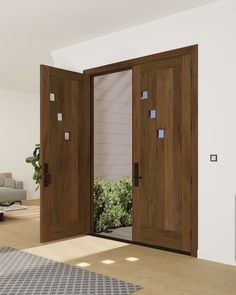 two wooden doors open in the middle of a room with a rug on the floor