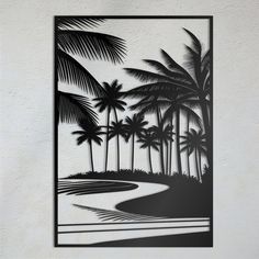 a black and white image of palm trees on the beach with water in the foreground