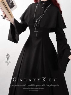 A classic cape dress that will make you look like a chaste and forbidden nun. Available in two colors: black and white. An item that makes you feel the strength of your will. Silhouette with a high waist and flared hem. It is also distinctive that the cufflinks are long. You can also remove the cape and wear it as a high neck dress. 
 
 Color 
 
 Black 
 White 
 
 
 Item 
 
 Long length 
 Middle length 
 
 
 
 Size 
 
 Long length 
 
 XS size 
 
 Length: 130cm 
 Shoulder width: 34cm 
 Bust: 80cm Gothic Long Sleeve Cape For Fall, Fitted Black Cape Dress, Black Fitted Cape Dress, Black Long Sleeve Medieval Dress, Black Long Sleeve Cape For Larp, Black Gothic Cape Outerwear, Vintage Black Winter Cape, Colors Black And White, Goth Dress