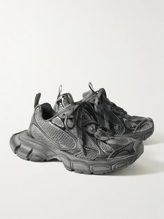 Balenciaga's Demna says that his beat-up designs can sometimes take longer to make than his more luxurious pieces. These running-inspired '3XL' sneakers are made from rubber-trimmed mesh and set on exaggerated soles. Balenciaga 3xl Sneaker, Balanciaga Shoes, Balenciaga Shoes Mens, Street Wear Shoes, Balenciaga Shoes Sneakers, Shoes Balenciaga, Techwear Fashion, Rubber Sneakers, Balenciaga Men