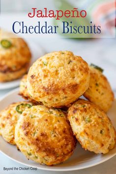 jalapeno cheddar biscuits on a plate with the title above it