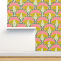 an image of a wallpaper with pink and yellow designs on it's side