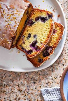 two slices of blueberry pound cake on a plate