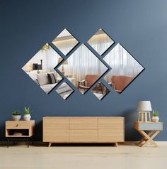 a living room scene with focus on the sideboard and mirror wall hanging above it