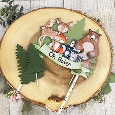 woodland baby shower cake topper with forest animals on it