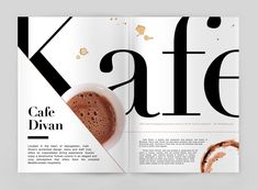 an open magazine with black and white designs on it's front cover, featuring coffee