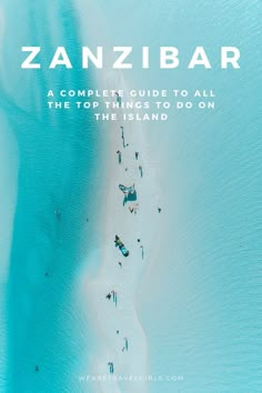 an aerial view of people walking on the beach in zanzibar, australia