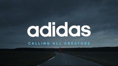 the words adidas are overlaided with an image of a person walking down a road