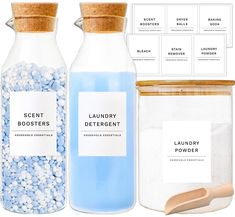 three glass jars with labels on them containing laundry detergents and bath salts next to each other