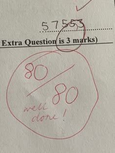 a close up of a piece of paper with a stamp on it that says, extra question is 3 marks