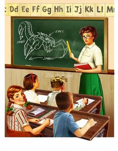 children sitting at desks in front of a blackboard with an image of a woman writing on it