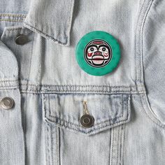 a button that says burgers burritos on the back of a jean jacket