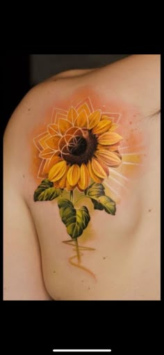 a woman with a sunflower tattoo on her shoulder