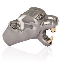 Rock and Roll meets refined craftsmanship. The unisex Panther head is both a classic and statement piece.  Hand carved and cast in solid Silver, plated in Black Rhodium with Diamonds and 9ct Gold teeth. Also available in Silver and Gold. Made in EnglandRhodium plated sterling silver, 9k gold and diamonds Panther Ring, Panther Head, Strange Fruit, Gold Teeth, Fruit Jewelry, Hood Ornaments, Silver Heart Pendant, Ring Black, Black Rhodium