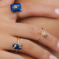 This statement serpent ring features a Lapis Lazuli surrounded by a winding Gold Plated Sterling Silver snake design, complete with detailed scales and markings, which extends from the slender band. A quick buff with a jewellery cleaning cloth will remove metal tarnishes and keep gemstones looking glossy. Please avoid contact with perfumes, cosmetics or chemicals. Lapis Lazuli Jewellery, Atelier Ideas, Serpent Ring, Lapis Jewelry, Lapis Lazuli Jewelry, High Jewellery, Lapis Lazuli Ring, Snake Design, Lapis Lazuli Stone