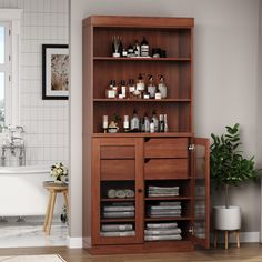 the bathroom is clean and ready to be used as a storage unit for personal care items