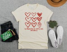 "Our Multi-Design Hearts CHD Awareness T-Shirt is a stylish and comfortable way to show your support for those affected by heart disease. The shirt features a beautiful collection of hearts in different designs, making it a unique and eye-catching piece. The words \"We Wear Red In February\" are prominently displayed, reminding everyone of the importance of raising awareness for heart disease and the impact it has on so many lives. Made from high-quality materials, this T-shirt is both soft and Heart Health Awareness Shirts, Heart Walk Shirt Ideas, February Heart Month, Chd Awareness Shirt, Heart Warrior Shirt, Heart Health Month, February Hearts, Heart Warrior, Heart Month