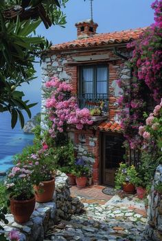 an old house with flowers growing on the outside