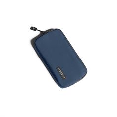 an empty blue case sitting on top of a white surface