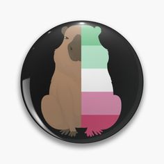 a button with an image of a dog on it's side, and the color scheme is multicolored