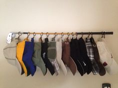 there are many pairs of shoes hanging on the wall