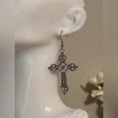 Silver Cross Earrings Large Cross Earrings Dangle Gothic Religious Vintage Gothic Cross Earrings Antique Silver Earrings Unisex Women Men Brand New New Handmade Silver Cross Earrings *Silver Cross Dangle Earrings *Measure 7cm X 4cm *Lightweight *Silver Plated Cross Charms *Ships Within 24 Hours Of Purchase Monday-Saturday. * If You Are Interested In More Than One Item From My Store Pleased Message Me To Make A Bundle For You With Combined Shipping. #Cross#Silver#Earrings#Goth#Punk Large Silver Cross Earrings, Gothic Cross Earrings, Goth Christmas Gifts, Single Cross Earring As Gift, Cross-shaped Jewelry With Matching Earrings, Purple Metal Chandelier Earrings As Gift, Purple Metal Chandelier Earrings For Gifts, Goth Cross, Silver Cross Earrings