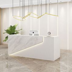 an office lobby with a marble reception desk and hanging lights above the counter, along with a plant