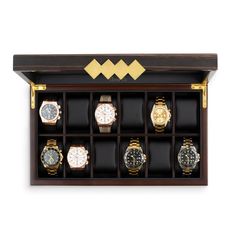 a wooden watch display case with twelve watches in it's compartments and gold accents