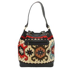 Our Bucket Bag is the perfect addition to any closet for the on-the-go trendsetter. This vintage Kilim bag can fit your everyday essentials whether you are running errands, on a date night, or even while traveling.The drawstring closure creates a unique silhouette while still protecting all of your belongings from falling out. You can utilize the interior open pocket and zipper pocket for loose change, sunglasses, or a small makeup bag. The structured black genuine leather base with brass feet h Luxury Bucket Bag With Adjustable Strap For Travel, Luxury Travel Bucket Bag With Adjustable Strap, Luxury Hobo Bag With Leather Handles For Travel, Luxury Travel Pouch Bucket Bag, Luxury Satchel Bucket Bag For Travel, Luxury Crossbody Bucket Bag For Travel, Brown Travel Bag With Dust Bag, Travel Crossbody Bucket Bag With Removable Pouch, Travel Bucket Bag With Removable Pouch Crossbody