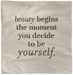 a piece of cloth with the words, beauty begins the moment you decide to be yourself