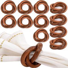 wooden rings and napkins on a white cloth