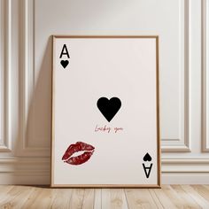 an ace playing card with lipstick on it