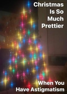 a christmas tree with lights on it and the words, christmas is so much prettier when you have astignism