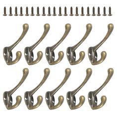 set of twelve brass door handles with screws on each side and one in the middle